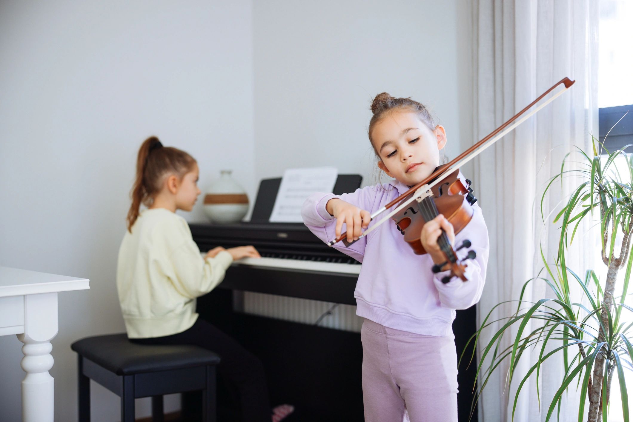 students learning music instruments